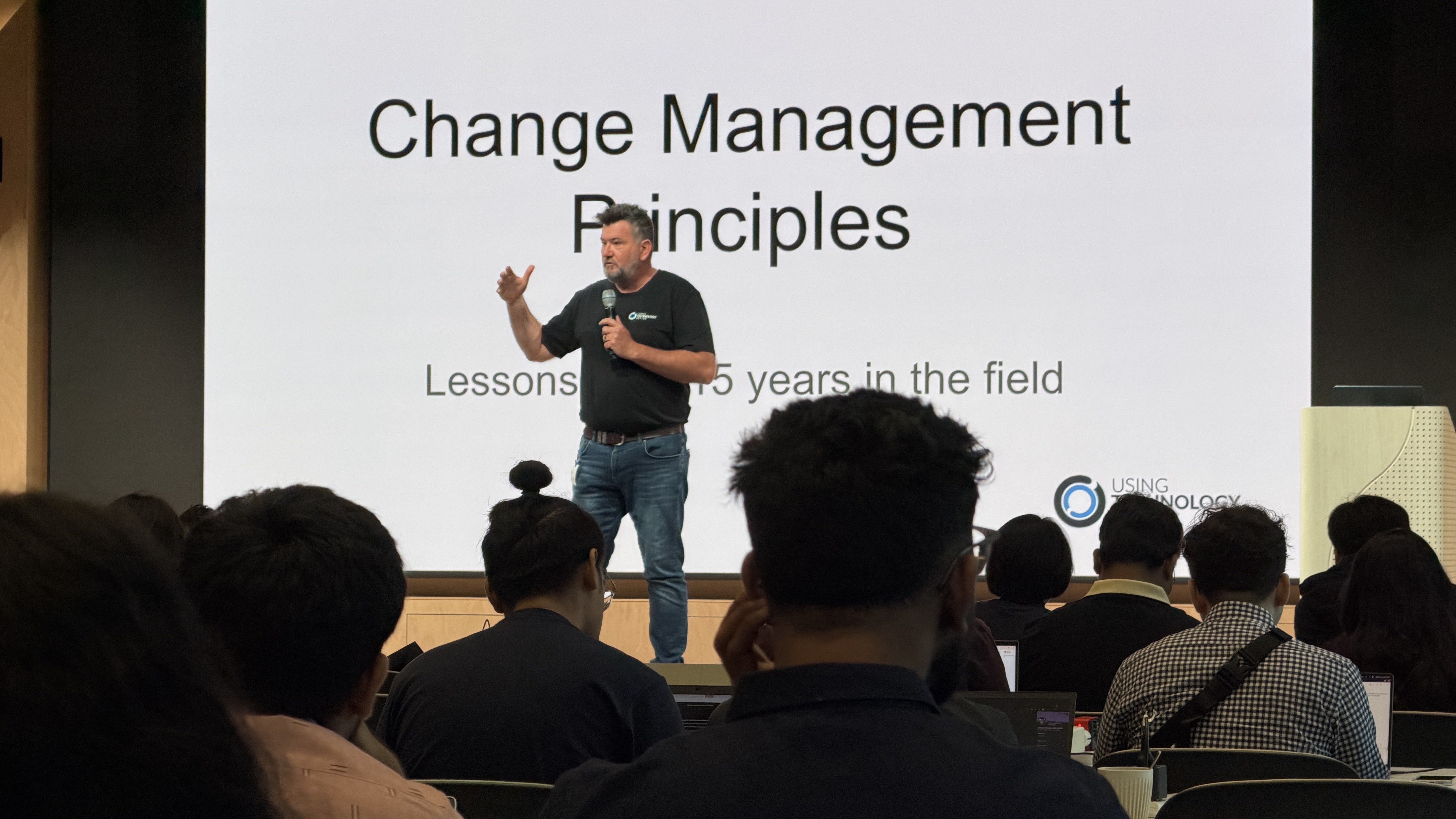 Mike Reading speaking at a conference
